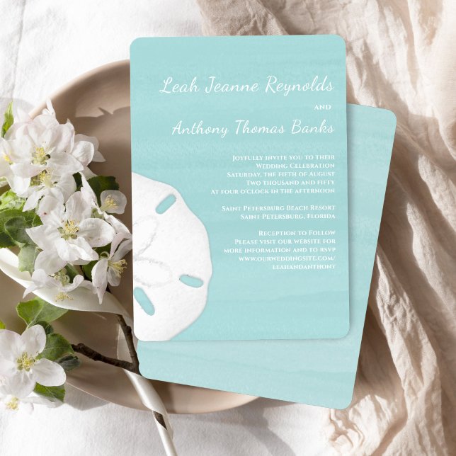 Beach Wedding Watercolor Sand Dollar Invitation (Turquoise beach wedding invitation with watercolor ocean and elegant sand dollar detail)