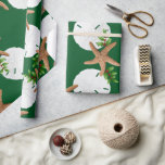 Beach Wreath Large Pattern Christmas Wrapping Paper<br><div class="desc">Quality Christmas wrapping paper on a roll with starfish and sand dollars "beach wreath" design. This large image is printed over a dark green background color, with seashells and holly in brown, white and green making a circular wreath pattern. If you don't see a background color you like, you may...</div>