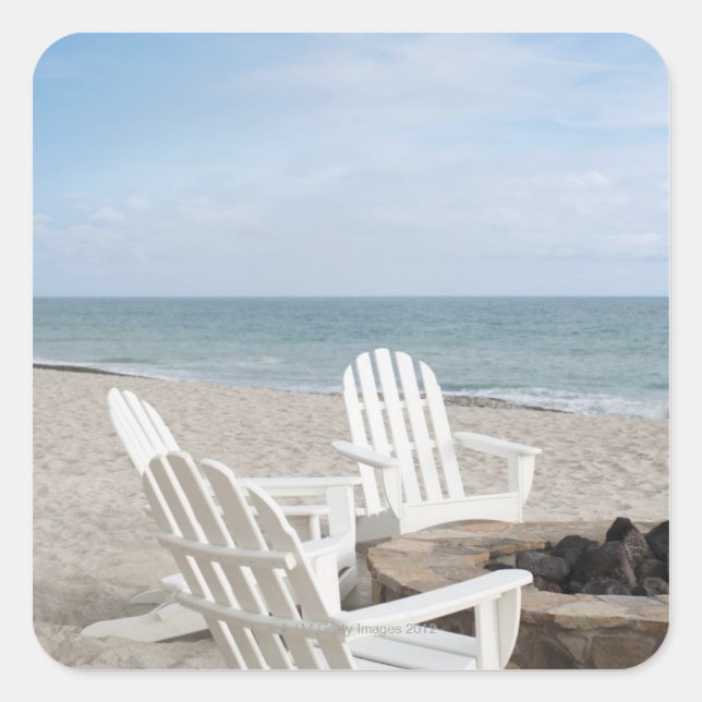 beachfront house with adirondack chairs and square sticker (Front)