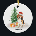 Beagle Dog Festive Santa Personalized Christmas Ceramic Ornament<br><div class="desc">Decorate your tree or give a special gift this holiday season with this elegant Merry Christmas beagle santa dog design christmas ornament, and matching decor. This beagle christmas ornament features a watercolor beagle dog with tree. Personalize with name front, year back . This beagle christmas ornament will be a favorite...</div>