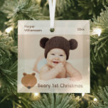 Bear Photo Baby First Christmas Glass Ornament<br><div class="desc">A photo baby’s first Christmas ornament with a cute bear face illustration. Simply customize this ornament with your baby’s name & photo & the year, add it to your cart, and enjoy it on your Christmas tree! Bear 1st Photo Baby First Christmas Glass Ornament Holidayday Design | ©Melissa Patton -...</div>
