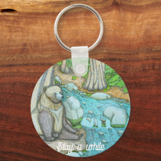 Bear sitting by a creek keychain