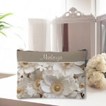 Beautiful 3D White Gardenia Wedding   Accessory Pouch<br><div class="desc">Discover our exquisite Accessory Pouch, adorned with 3D White Gardenia Floral designs and elegant gold accents. This stunning pouch features lifelike white gardenias that seem to bloom right off the fabric, complemented by luxurious gold touches that add a hint of sophistication. Easy to personalize with your name or give as...</div>