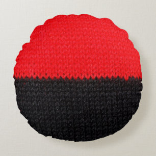 beautiful black and red knitted fabric with drawin round pillow