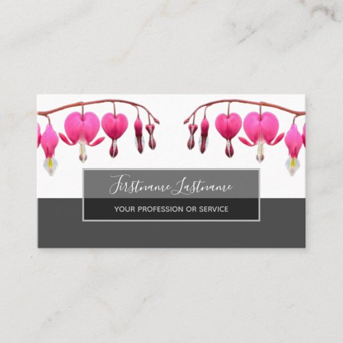 Beautiful bleeding hearts blossoms on gray business card