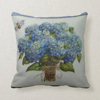 beautiful blue hydrangeas with a bee throw pillow