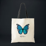 Beautiful Blue Watercolor 3D Butterfly Tote Bag<br><div class="desc">Create your own personalized butterfly tote bags on an elegant DIY template that is easy to add your monogram letter, name, initials, or short inspirational phrase/quote to. The rustic watercolor artwork illustrated by the artists Raphaela Wilson spotlights a beautiful blue monarch butterfly with a shadow beneath its floral pattern wings...</div>