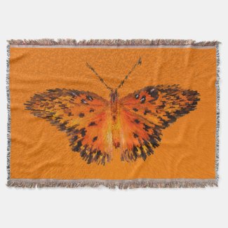 Beautiful butterfly wings on orange background