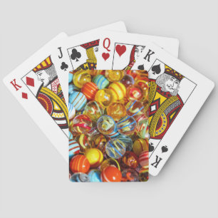 beautiful colorful glass marble balls photograph poker cards