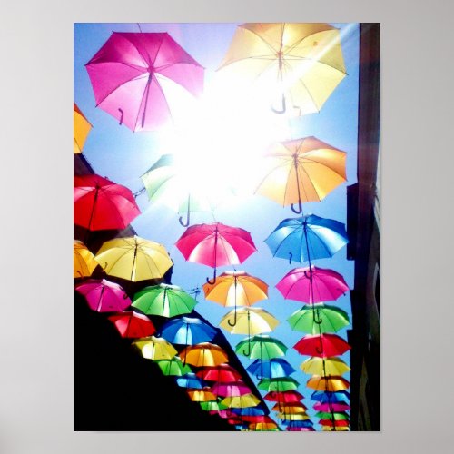 Beautiful Colorful Umbrellas Hanged Over Street  Poster
