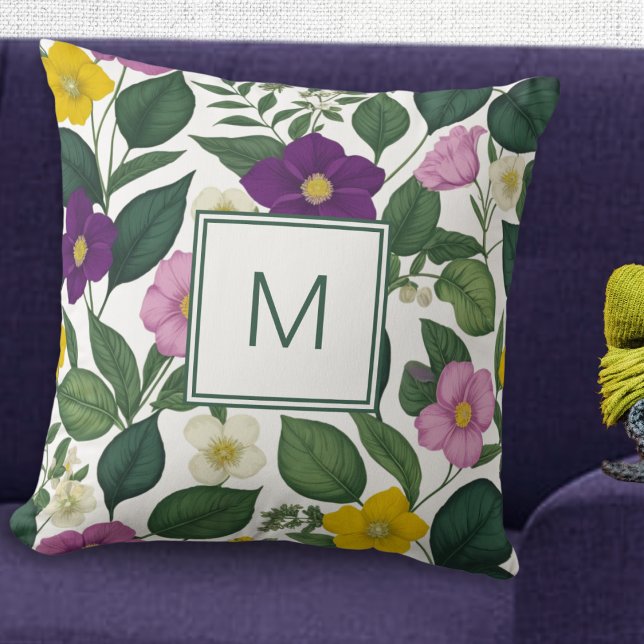 Beautiful Elegant Floral Print Spring Flowers Throw Pillow (A pretty monogrammed cushion with purple, pink, yellow and white flowers and green leaves)