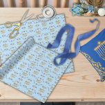 Beautiful Elegant Light Blue Hanukkah Wrapping Paper<br><div class="desc">Enhance the presentation of your gifts with our exquisite light blue wrapping paper, designed specifically for the Hanukkah holiday. These elegant wrapping features charming motifs that embody the spirit of the celebration, including illustrations of love and light with the menorah, vibrant berries, and the iconic Star of David. Perfect for...</div>