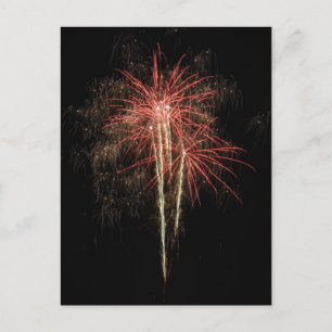 Beautiful fireworks on the black sky background postcard