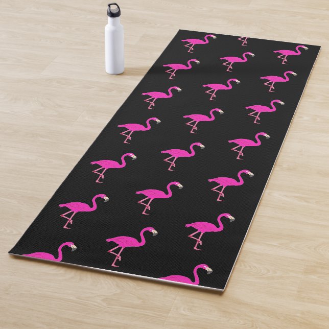 Beautiful flamingos on black yoga mat (In Situ)