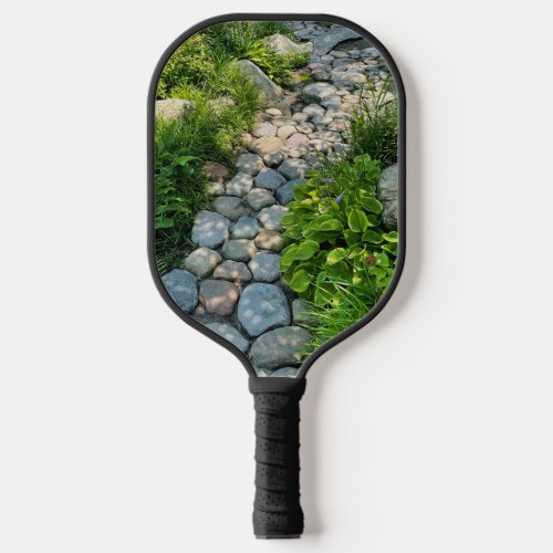 Beautiful forest scene sunny stone walkway photo  pickleball paddle