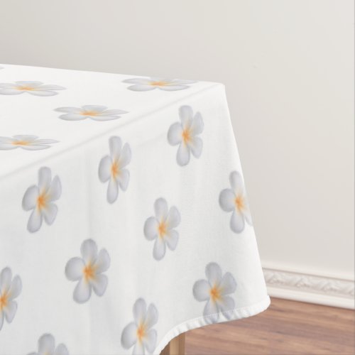 Beautiful Frangipani Plumeria Flowers on White Tablecloth