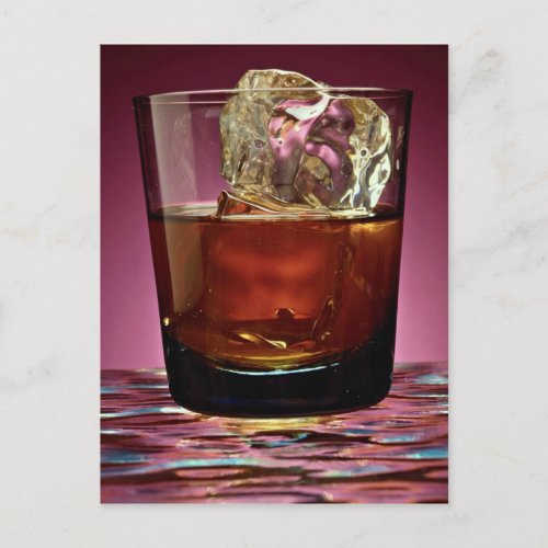 Beautiful glass filled with Whiskey and ice cube Postcard