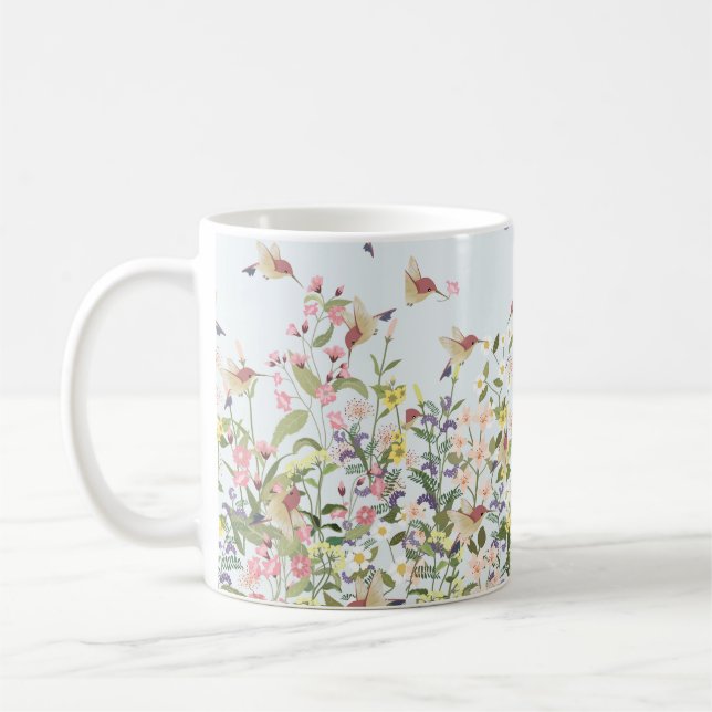 Beautiful hummingbird in sweet floral flower garde coffee mug (Left)