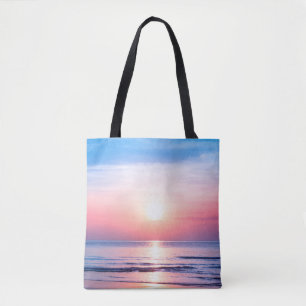 Beautiful morning sunrise, blue sea, pink sky, whi tote bag
