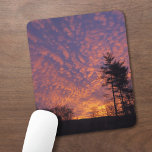 Beautiful Pink Orange Clouds Sunrise Photo Mouse Pad<br><div class="desc">Beautiful pink and light orange clouds fill a sunrise sky beyond small black trees in the distance. A few tall pine trees stand in silhouette on the right side of the photo. The yellow morning sun peeks through clouds near the horizon. To see the photograph Beautiful Sunrise Sky on other...</div>