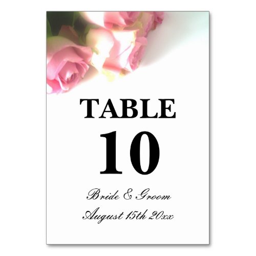 Beautiful pink rose flower bouquet photo wedding table number