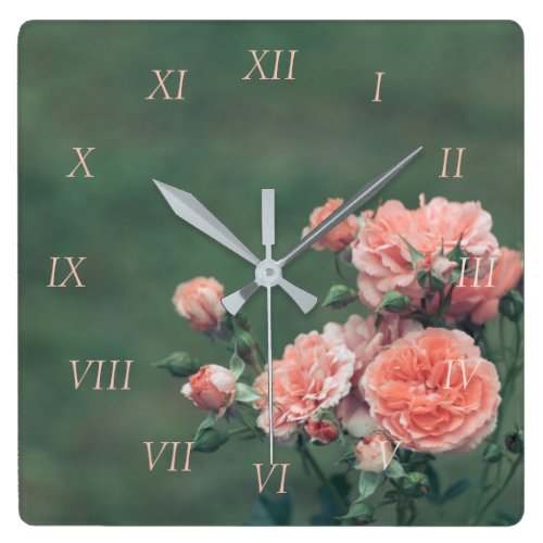 Beautiful pink roses on a natural green background square wall clock
