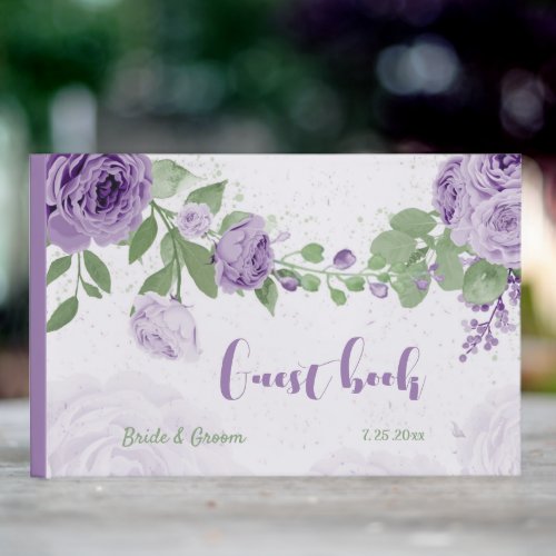 beautiful purple flowers greenery wedding guest book
