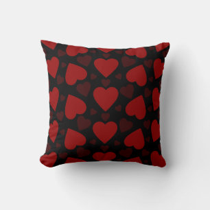 Beautiful red heart pattern on black throw pillow