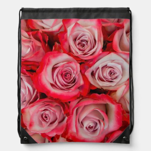 Beautiful roses in pink and red flower bouquet  drawstring bag