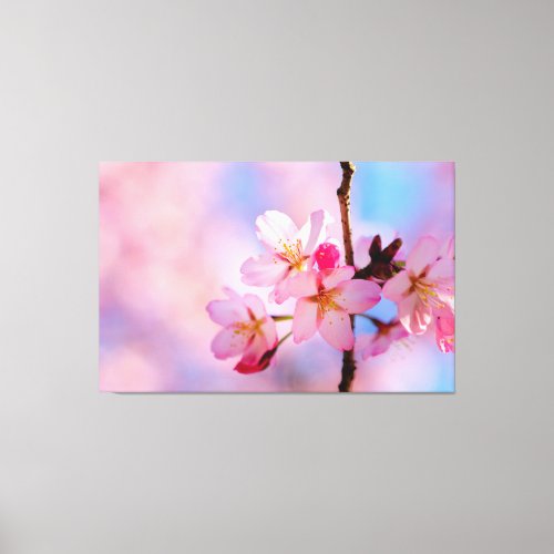 Beautiful Sakura Flowers On A Vertical Twig Canvas Print