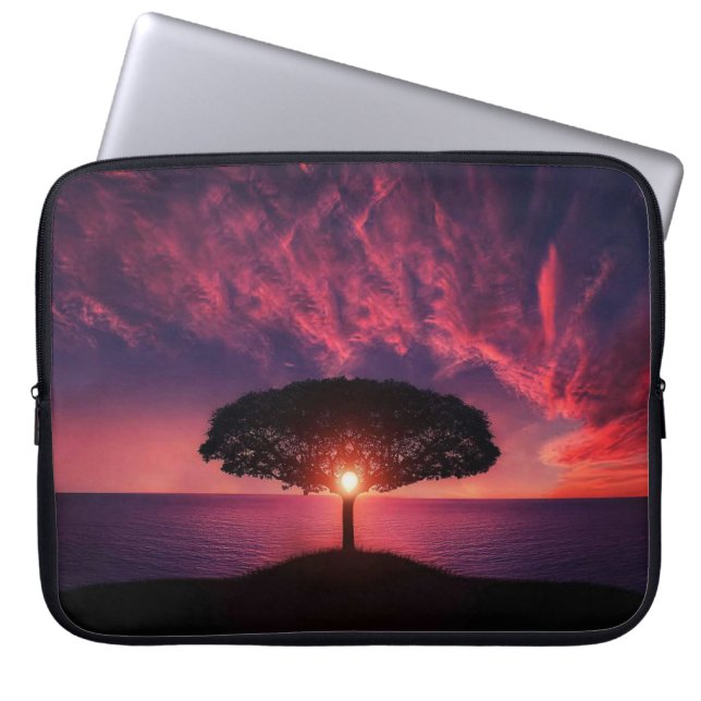 Beautiful scenery with the sun rising behind a tre laptop sleeve (Front)