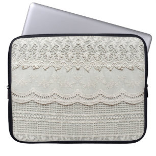 Beautiful, subtle, white laced textile close up.  laptop sleeve
