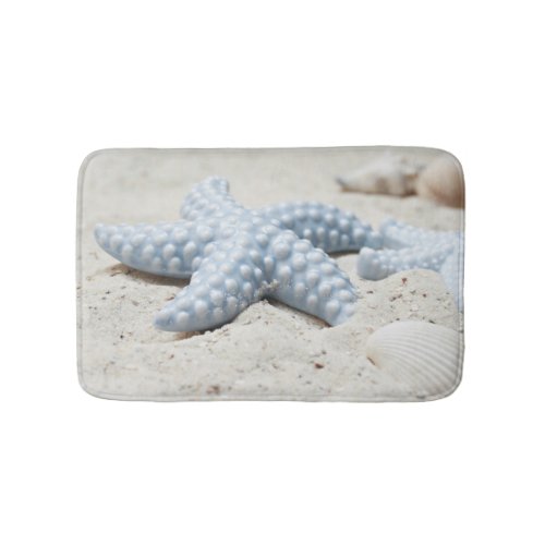 Beautiful summer beach sea star shell and sand bathroom mat