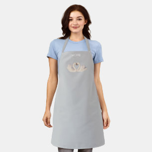Beautiful swan couple on silver grey apron