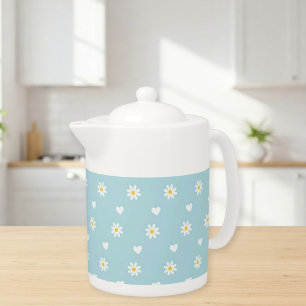 Beautiful teapot with a blue daisy pattern