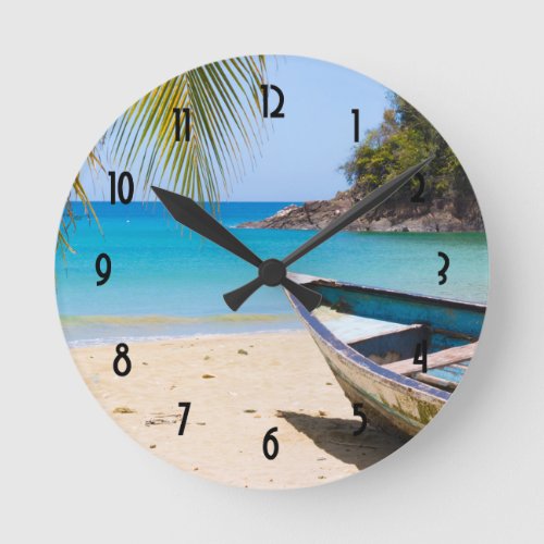 Beautiful Tropical Beach with a Rowboat Round Clock