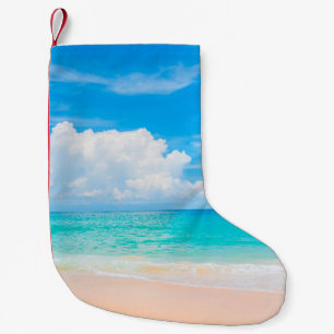 Beautiful tropical beach with blue sky and white c small christmas stocking