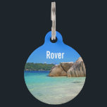 Beautiful Tropical Sea with a Rocky Beach Pet ID Tag<br><div class="desc">Personalized pet tag with a photograph of a turquoise blue ocean beach with big rocks scattered along the coast. Bright and sunny tropical locale.</div>