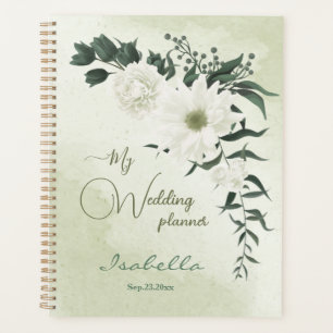 beautiful white floral greenery wedding planner