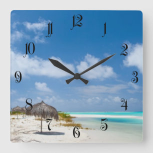 Beautiful white sand beach and turquoise ocean square wall clock