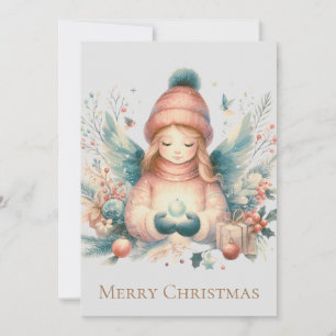 Beautiful winter angel amidst the northern nature holiday card