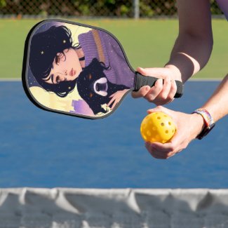 Beautiful woman in a sweater and a dog, pickleball paddle