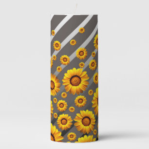 Beautiful yellow flowers on gray, silver stripes pillar candle
