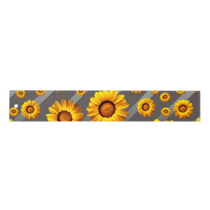Beautiful yellow flowers on gray, silver stripes   ruler