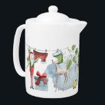 Beautifully Folk Art Illustrated Personalized Xmas Teapot<br><div class="desc">The personalized greeting and name is carefully placed on one of the gifts, change the view of the teapot to see it! This beautifully Folk Art Illustrated Personalized Christmas Teapot make a truly adorable keepsake gift and collectors item for men or women who collect teapot. This is for display and...</div>