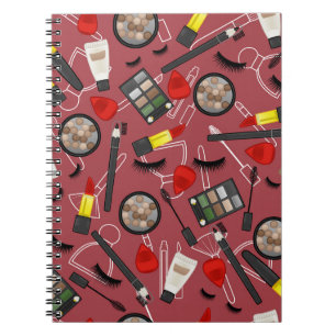Beauty products pattern on a red backgroundapplica notebook