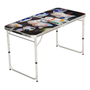 Beckoning cat figurines beer pong table