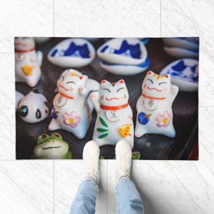 Beckoning cat figurines doormat