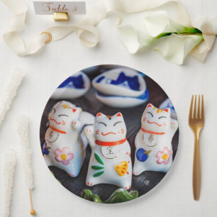 Beckoning cat figurines paper plates