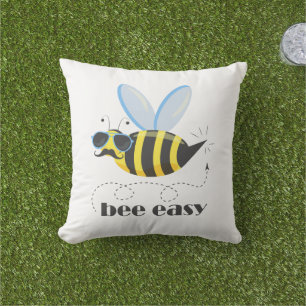 Bee character with mustache sunglasses Bee Easy Outdoor Pillow